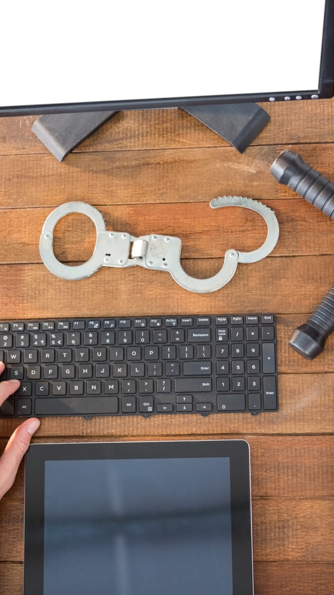 hands-of-security-officer-using-computer.jpg